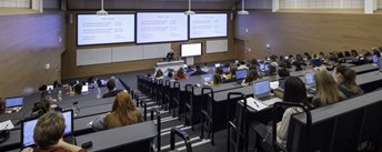 Students sitting in a lecture theatre