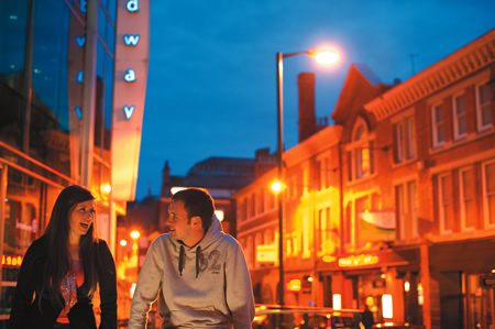 Two students at night in Nottingham city centre