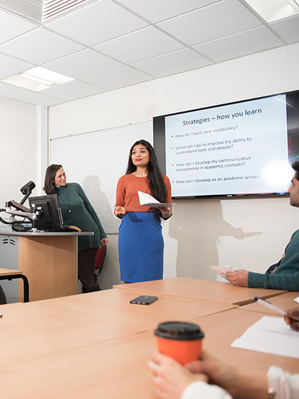 CELE students in classroom with teacher