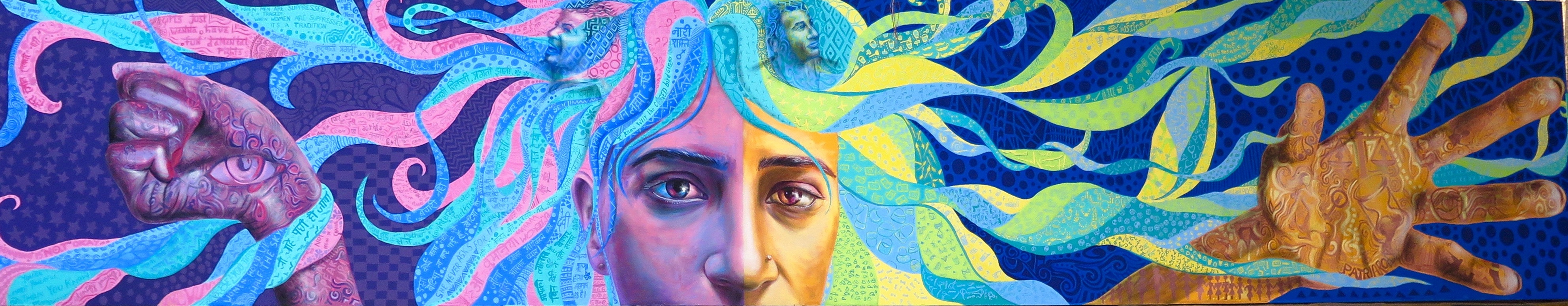 Colourful mural of a woman reaching out