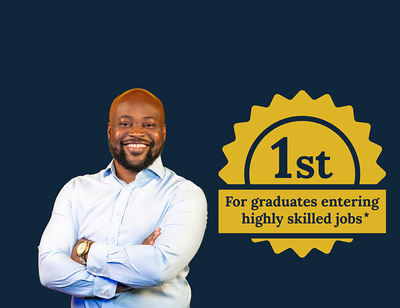 man standing with arms crossed with blue background