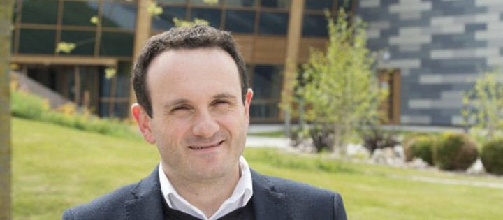 Chris Gerada standing outside on campus