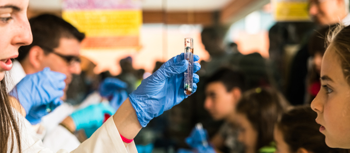 Science experiment in front of school children