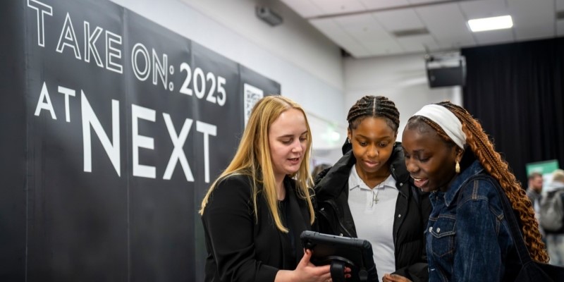 Students connecting with employers at an event