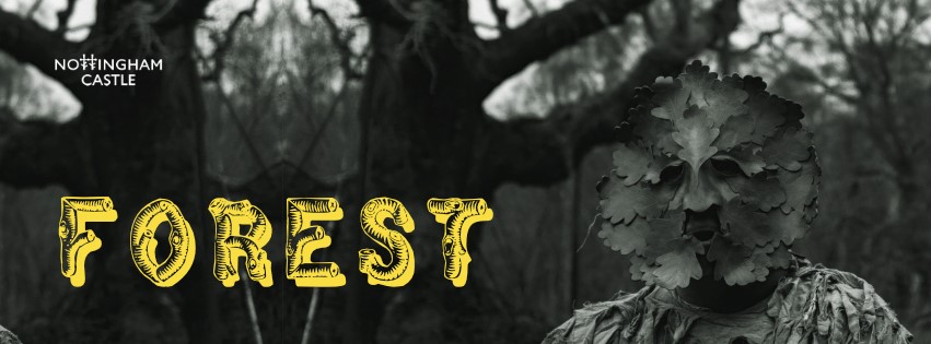 Masked figure in tree costume in front of the Major Oak with the Nottingham Castle logo and 'FOREST' text below