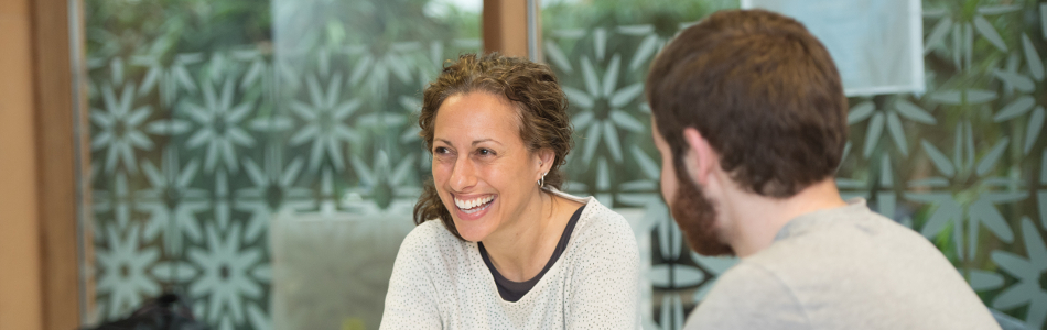 Two postgraduate students in conversation