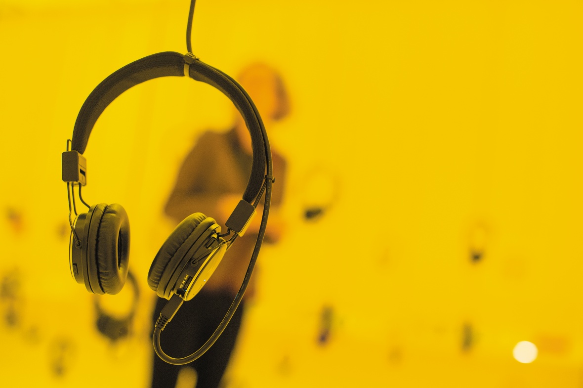 Headphones on yellow background