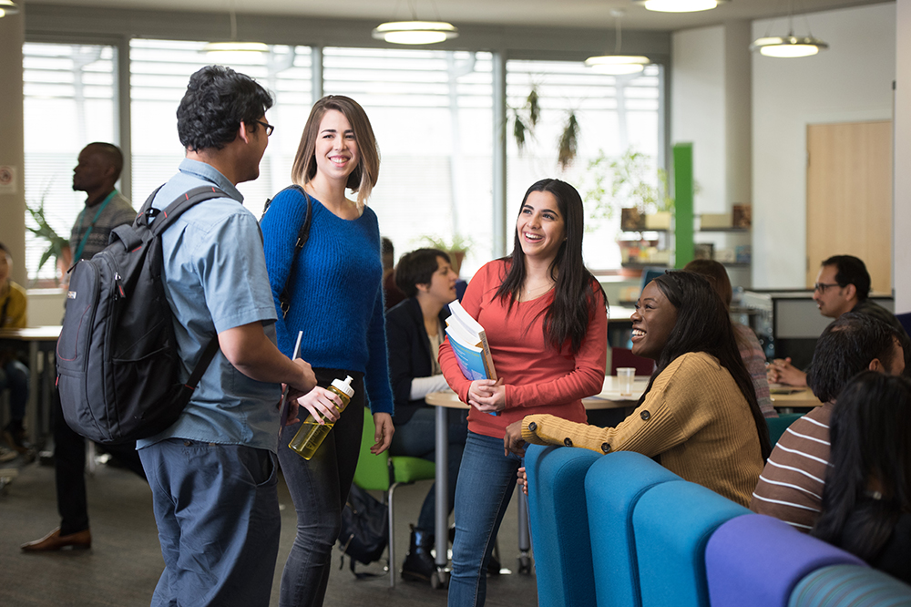 Three postgraduates talking