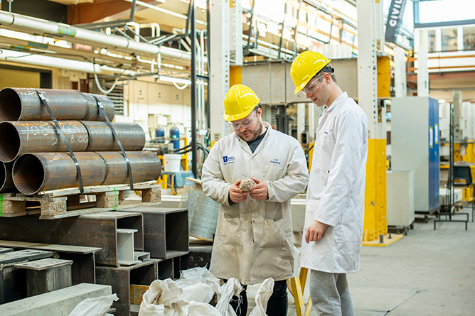 Students identifying concrete cubes used to test concrete strength