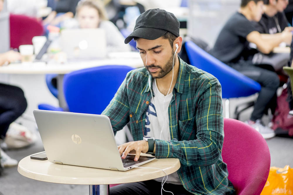 Student working on a laptop