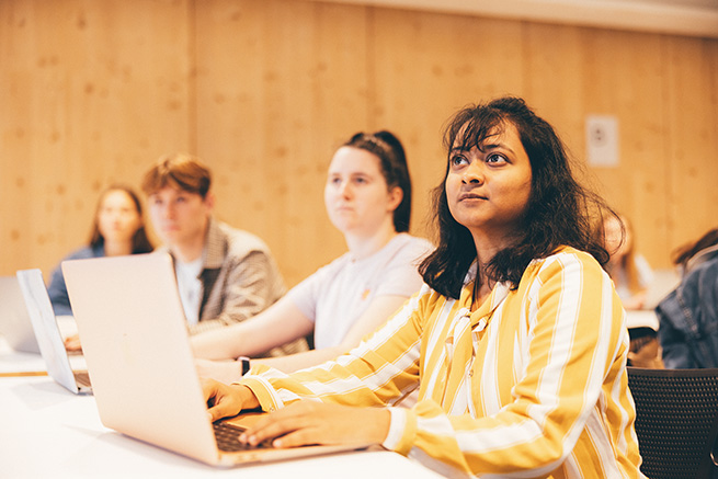 Undergraduates attending a seminar in the Monica Partridge Building