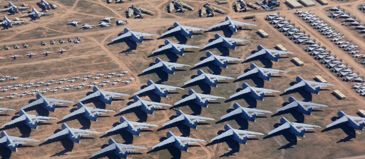 Aeroplanes parked up in rows