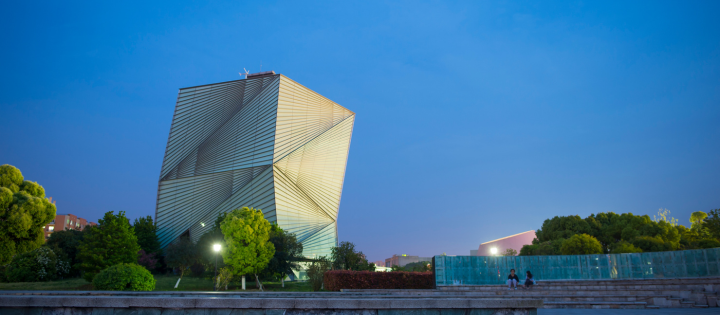 Photo of the Centre for Sustainable Energy Technologies (CSET) building at dusk.