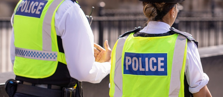 A male and female police officer in uniform