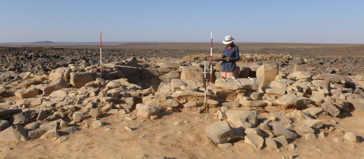 Man exploring previous climates in lake sediments