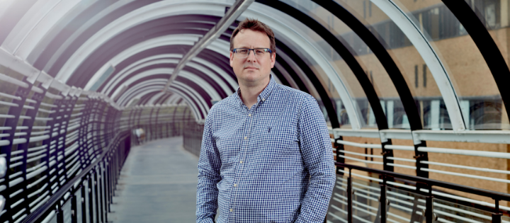 Professor Matthew Loose, standing on the QMC tram link bridge, Queen's Medical Centre (QMC)